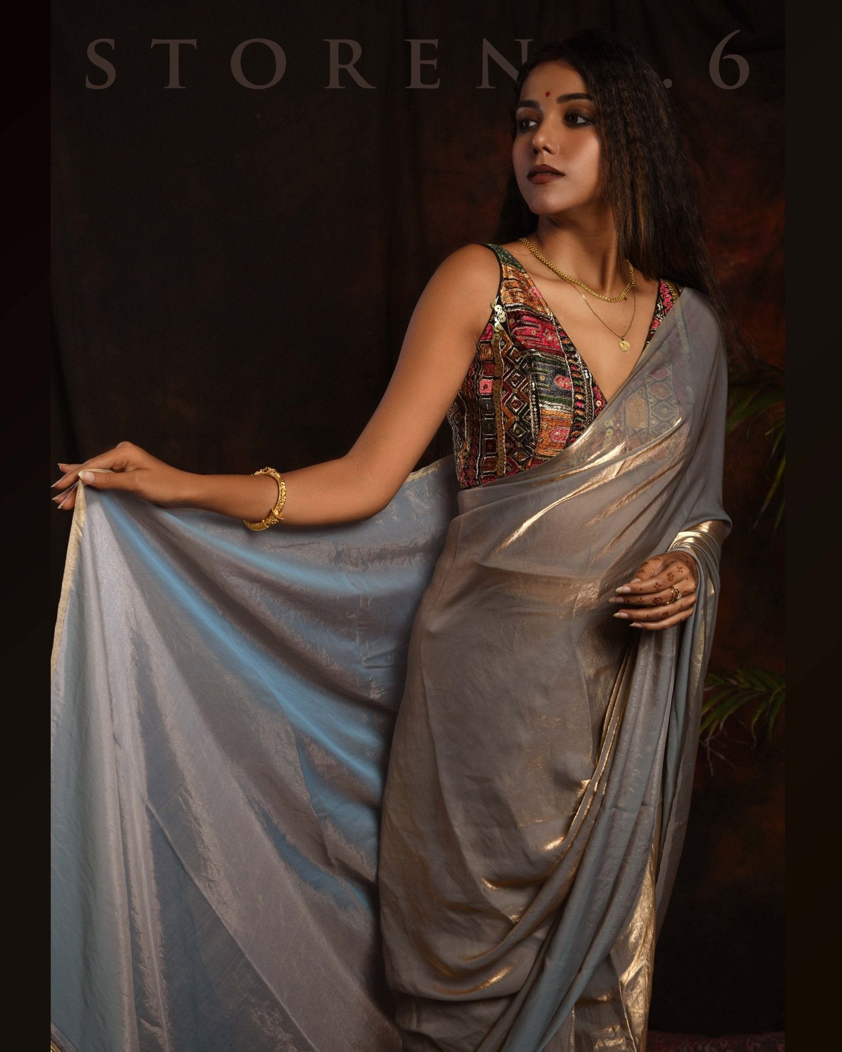 THE FORBIDDEN OASIS SAREE WITH GUL KAARI SIAH PLUNGE SLEEVELESS BLOUSE