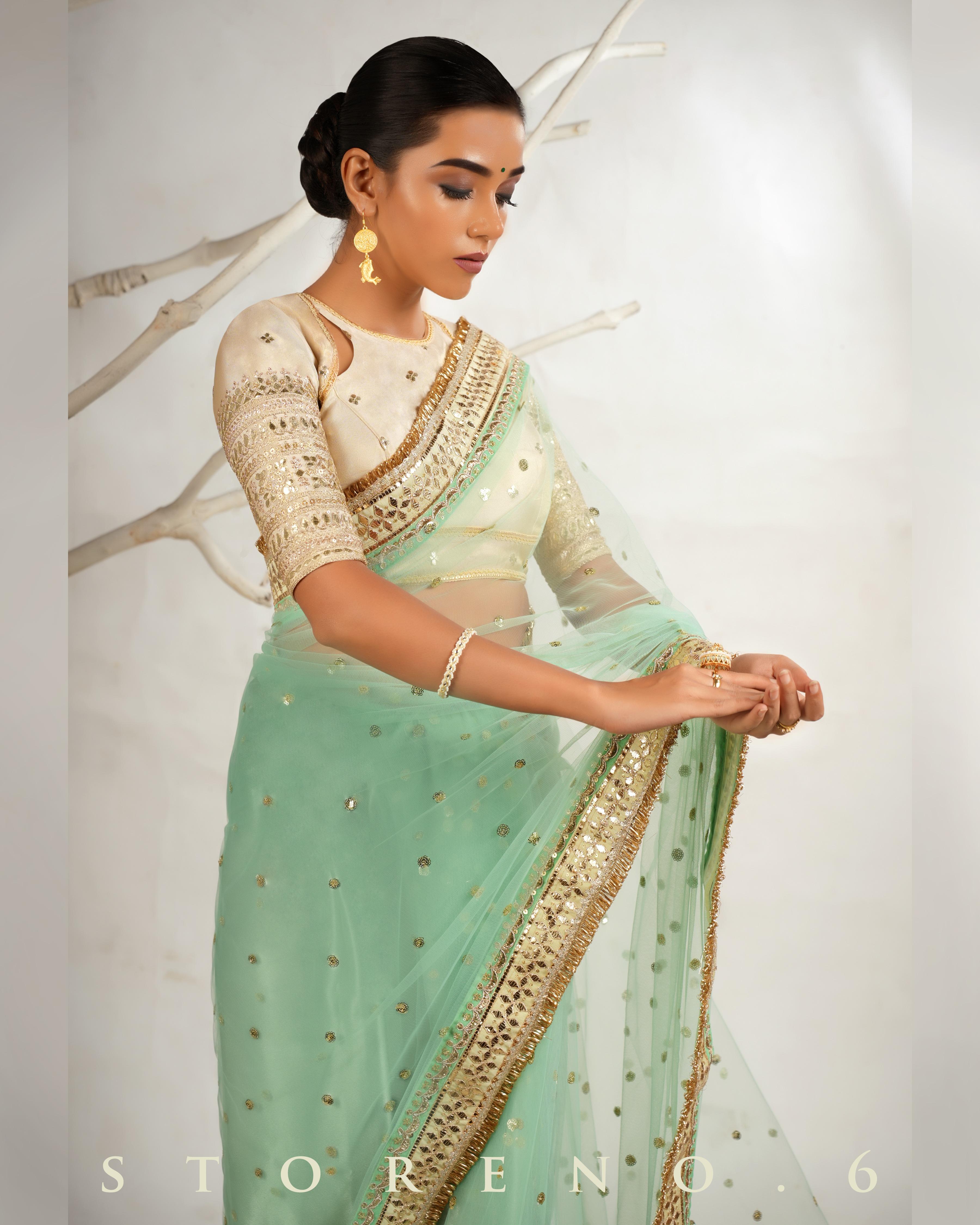 STELLAR SEAFOAM SAREE WITH THE CLASSIC CHAMPAGNE BLOUSE