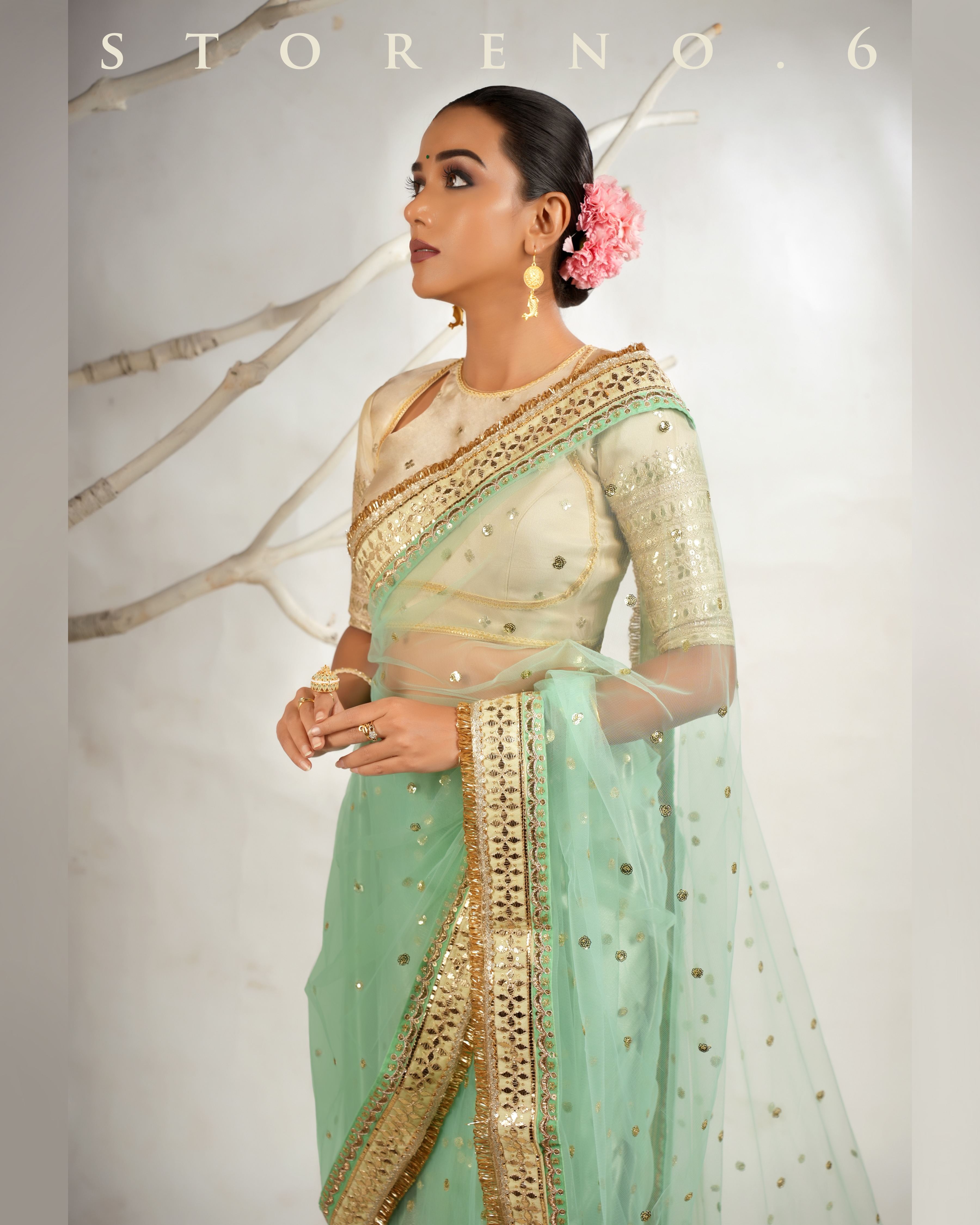 STELLAR SEAFOAM SAREE WITH THE CLASSIC CHAMPAGNE BLOUSE