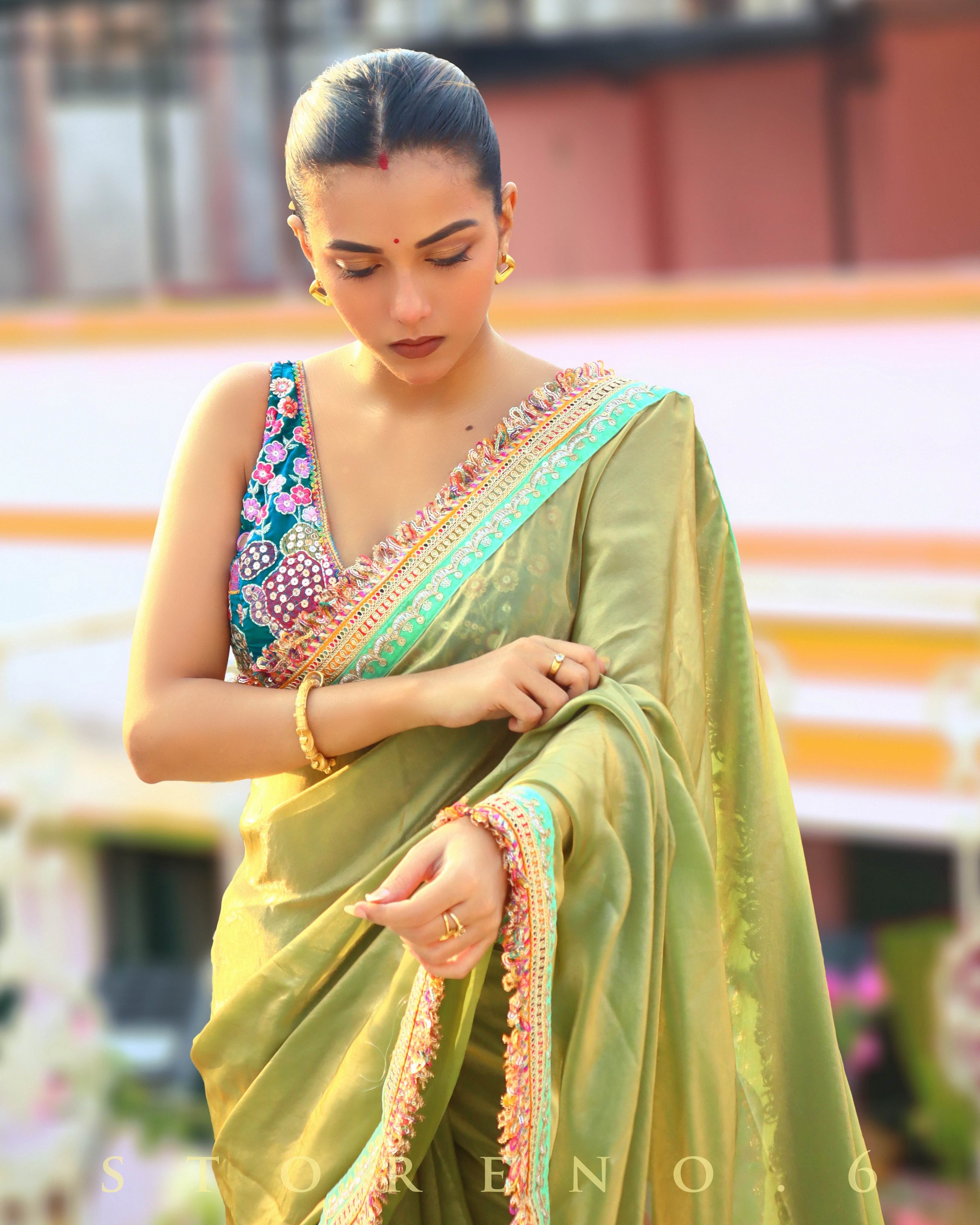 AUGUST ADVENTURE SAREE AND TROPICAL TEAL SLEEVELESS BLOUSE