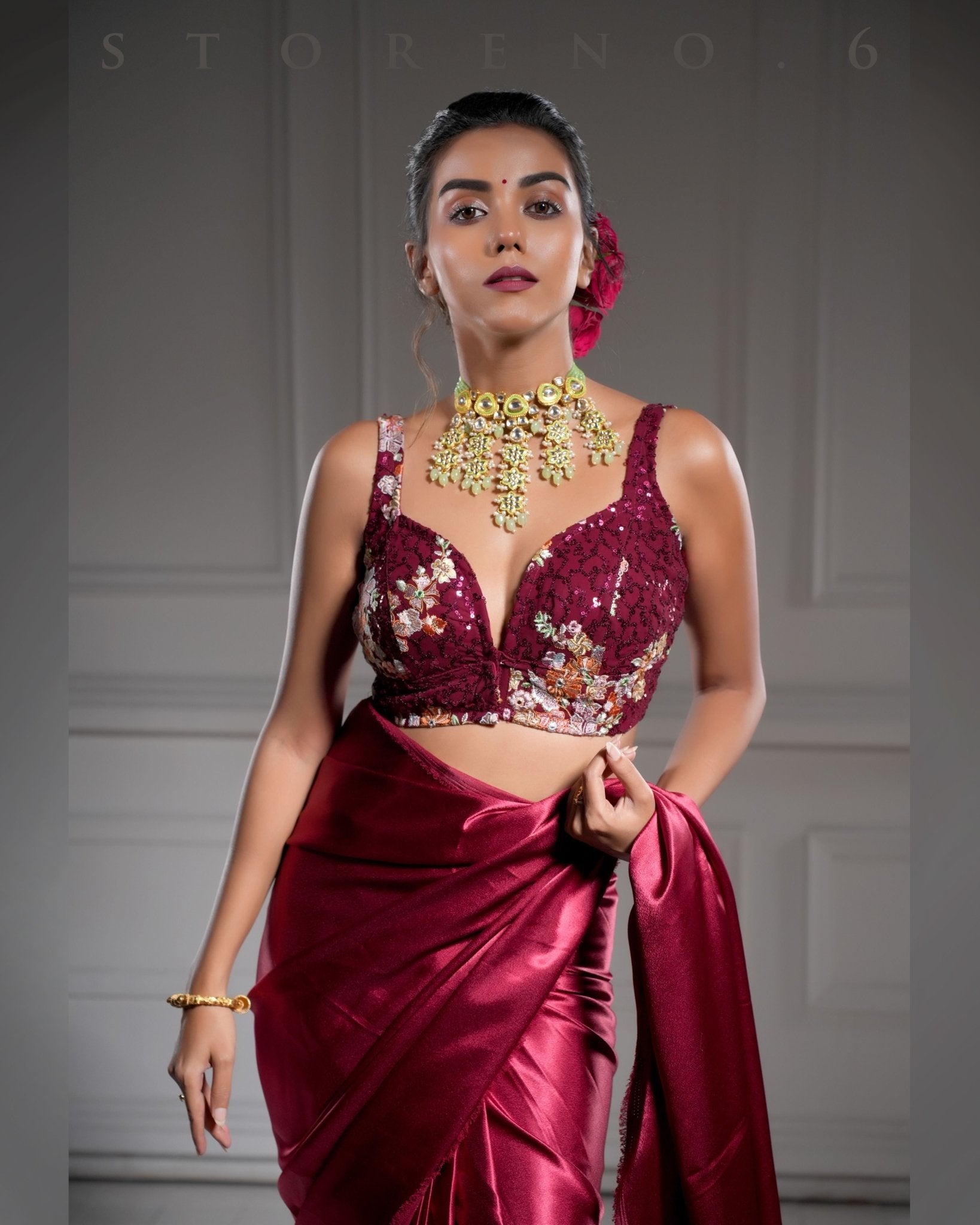 BURGUNDY BIZARRE SAREE WITH RAAKT AFSOON SLEEVELESS PLUNGE BLOUSE