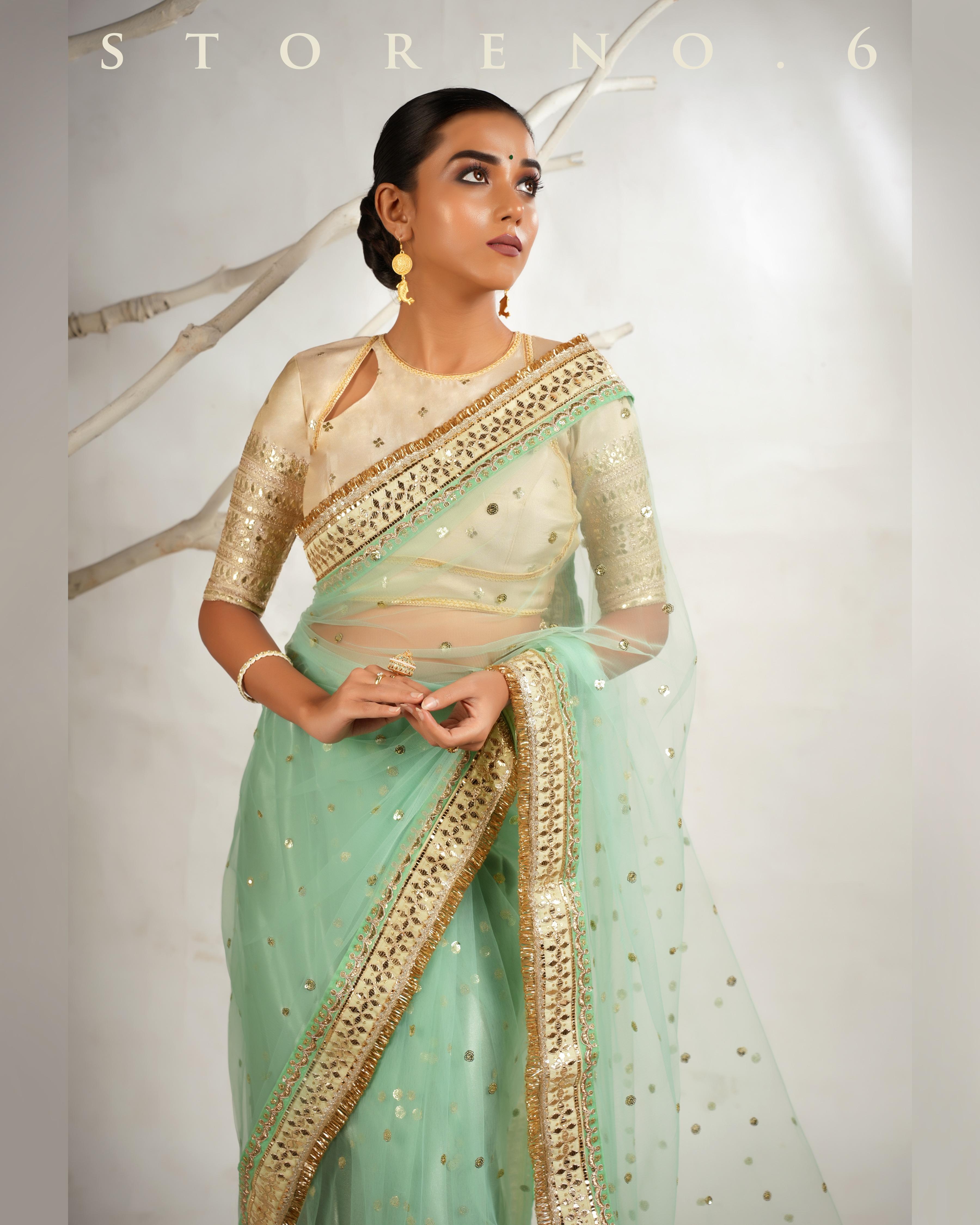 STELLAR SEAFOAM SAREE WITH THE CLASSIC CHAMPAGNE BLOUSE