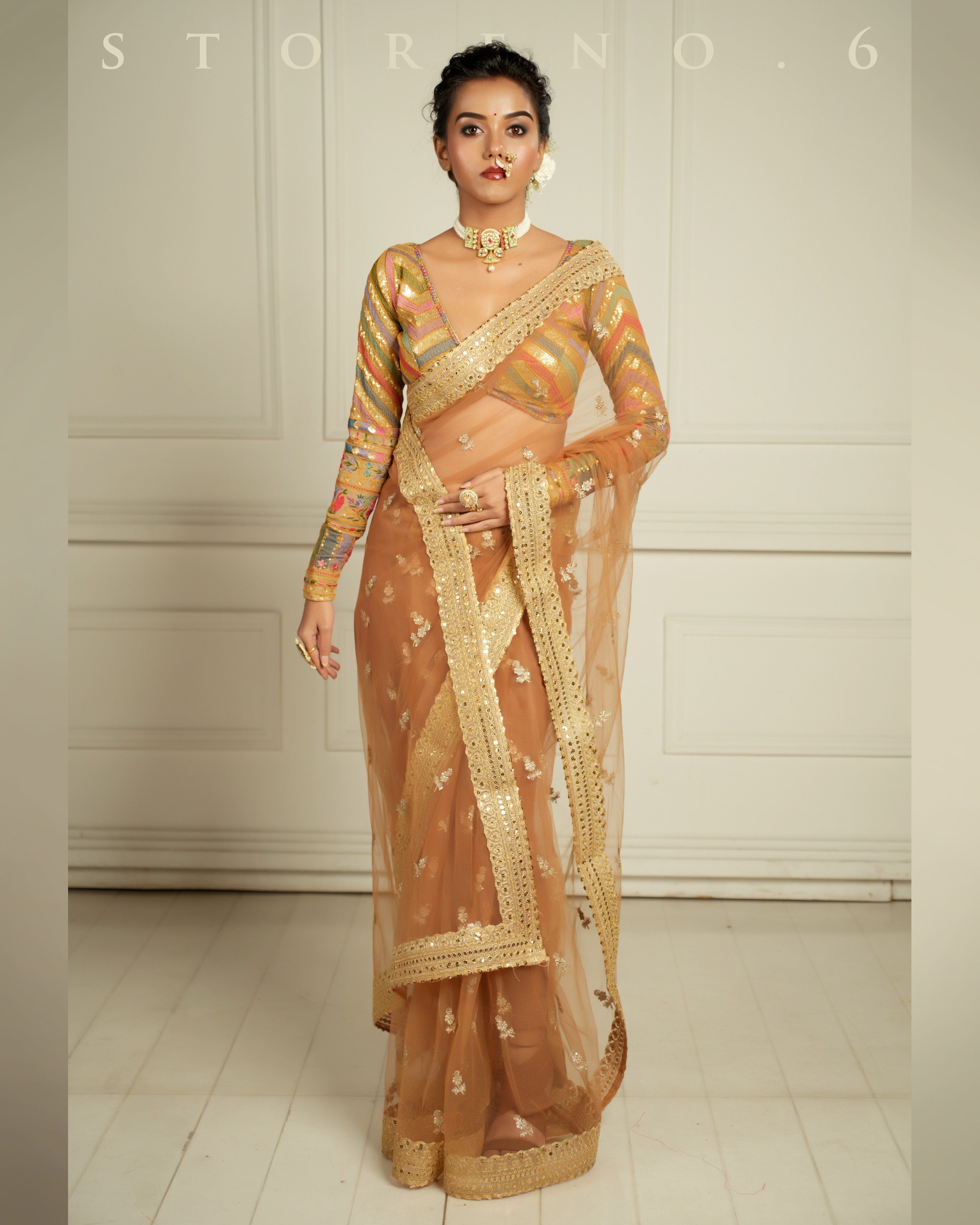 THE QUEEN'S EXOTIC EXPRESSO SAREE WITH BEBAAK SURMAI BLOUSE