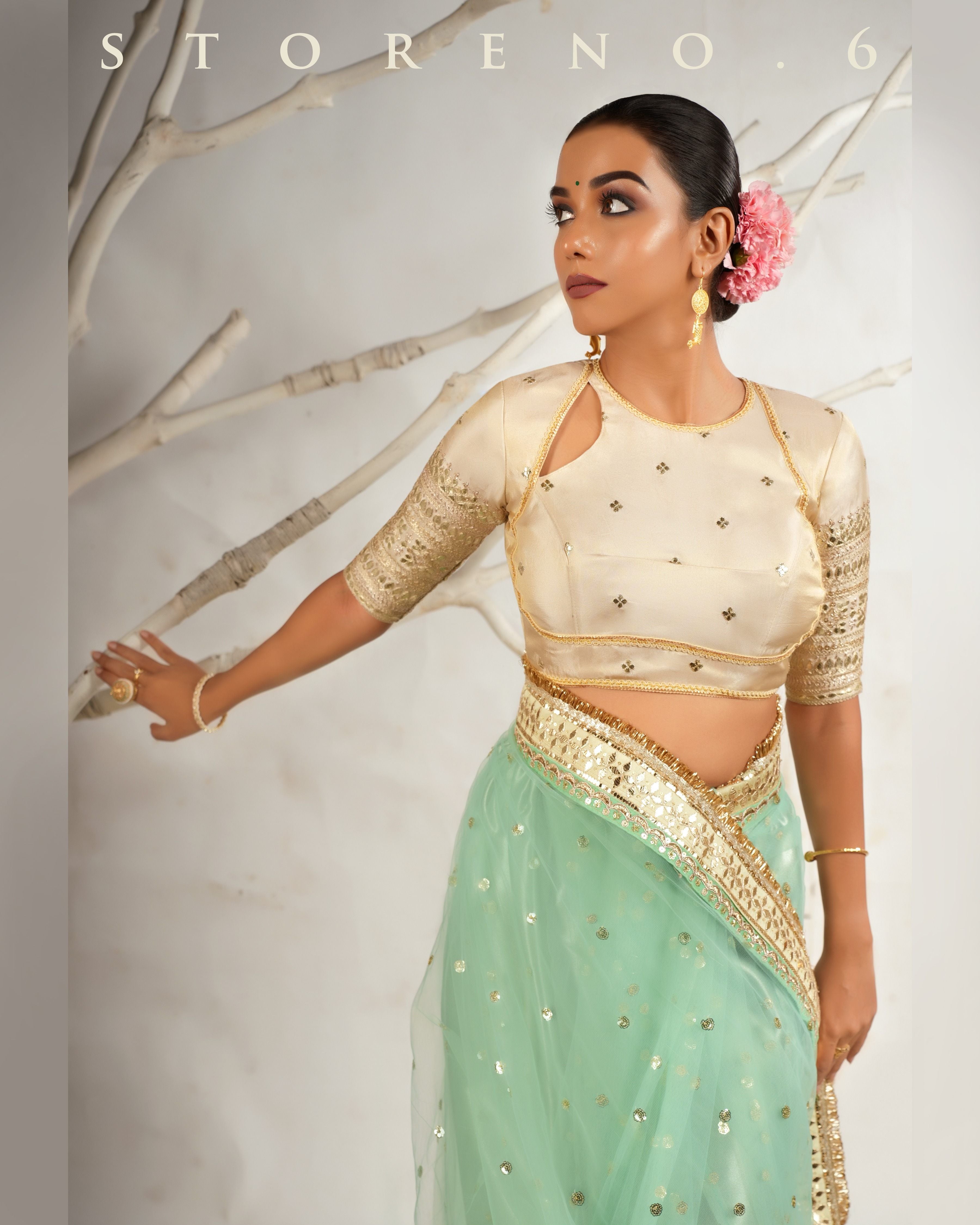 STELLAR SEAFOAM SAREE WITH THE CLASSIC CHAMPAGNE BLOUSE