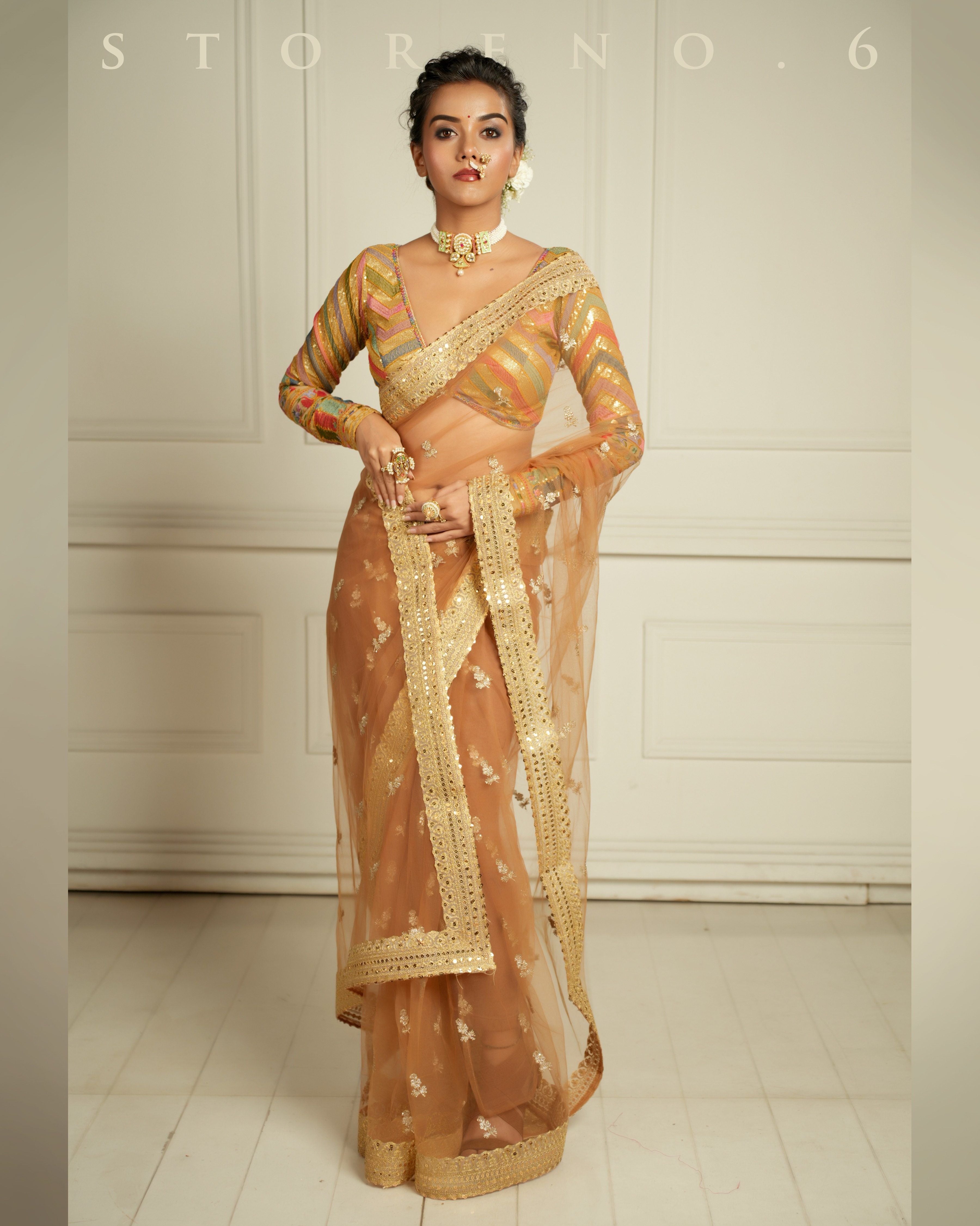 THE QUEEN'S EXOTIC EXPRESSO SAREE WITH BEBAAK SURMAI BLOUSE