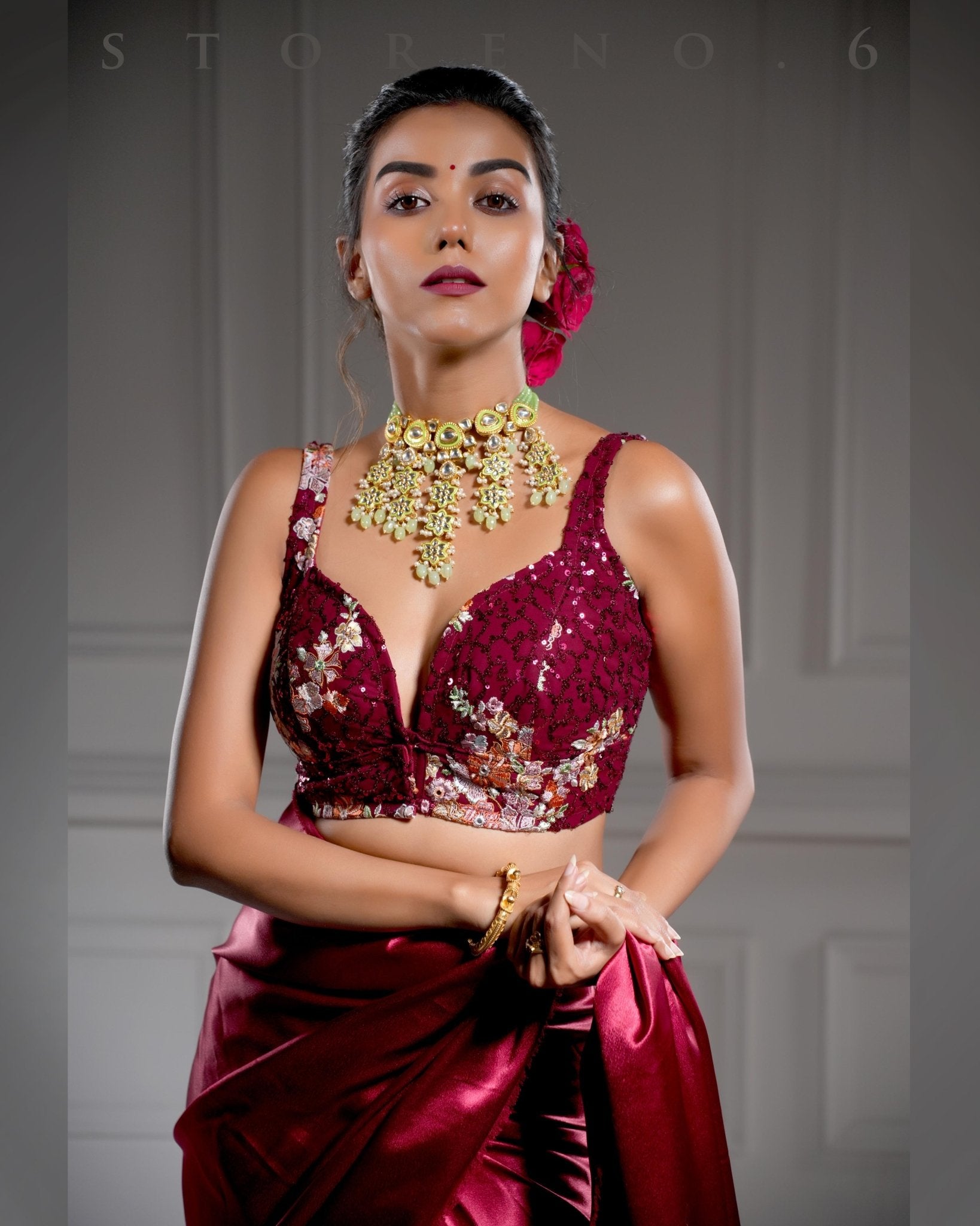 BURGUNDY BIZARRE SAREE WITH RAAKT AFSOON SLEEVELESS PLUNGE BLOUSE